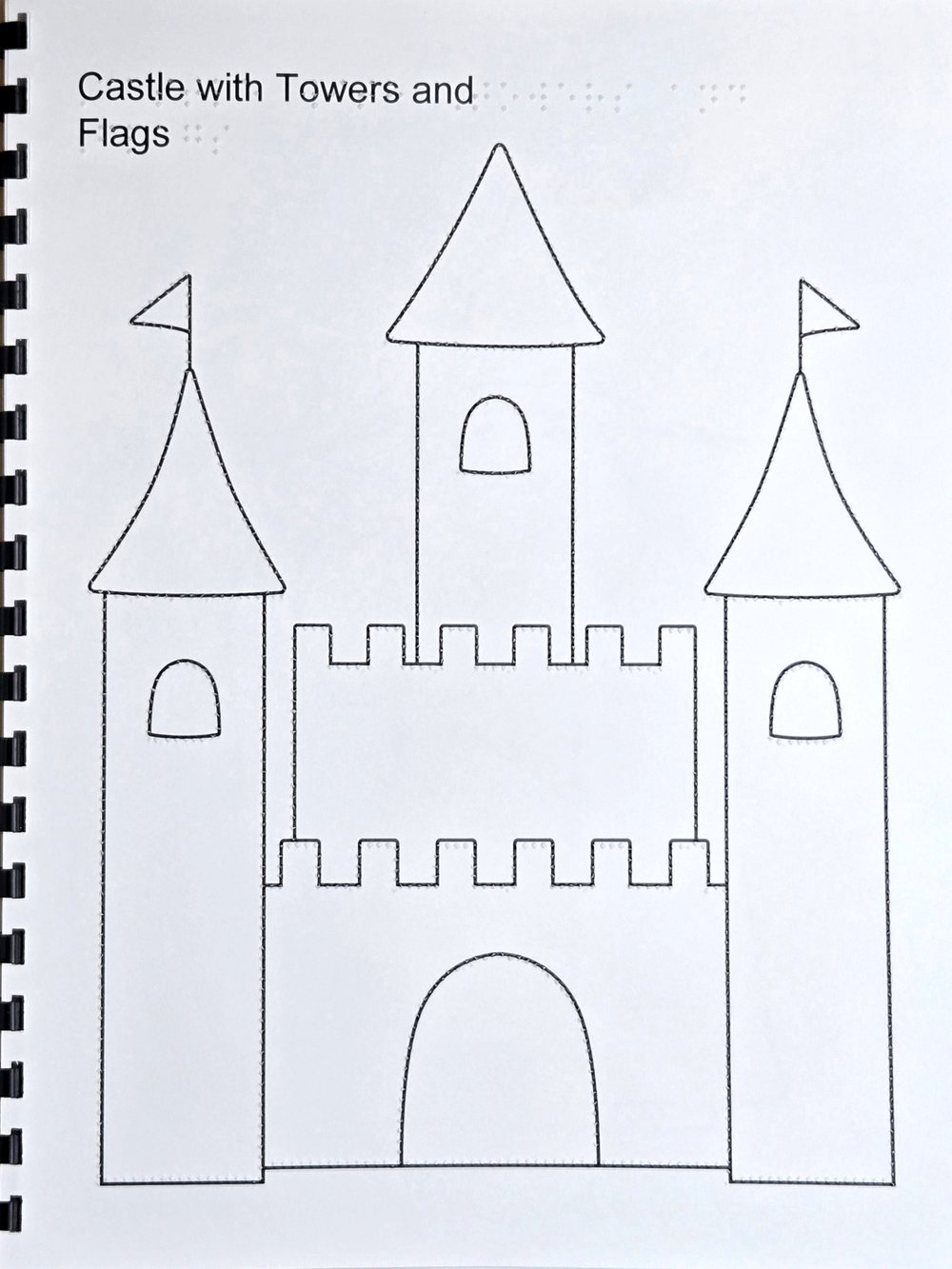 Page from a tactile coloring book: a castle with three towers, flags, windows and a gate, drawn with black lines and raised dots